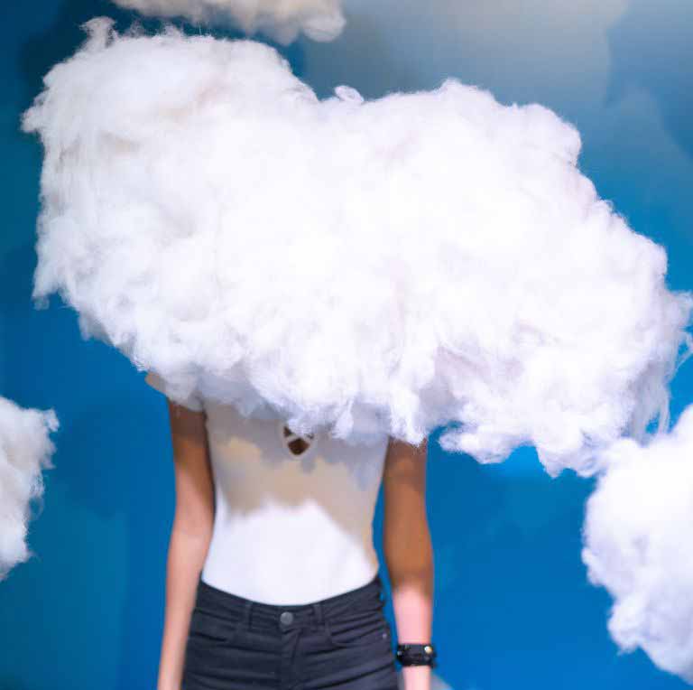 Woman contemplation at clouds on background royalty free image 1010177068 1545327565.jpg